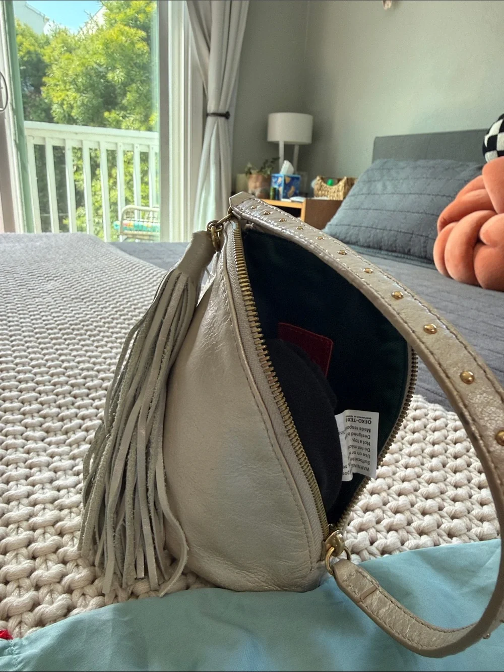 Hobo Pebbled Leather Tassel Wristlet - Silver
